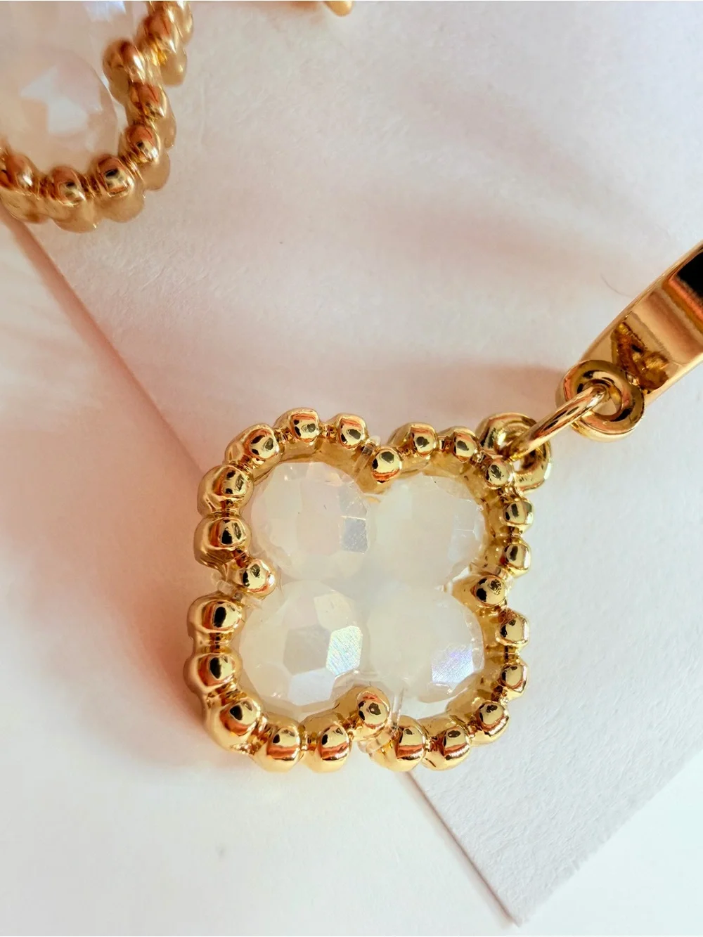 Gold Clover Drop Earrings with Opalescent Stones